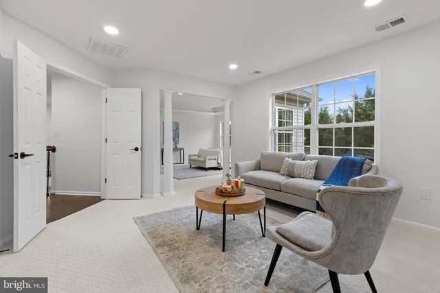 an empty room with windows and yard