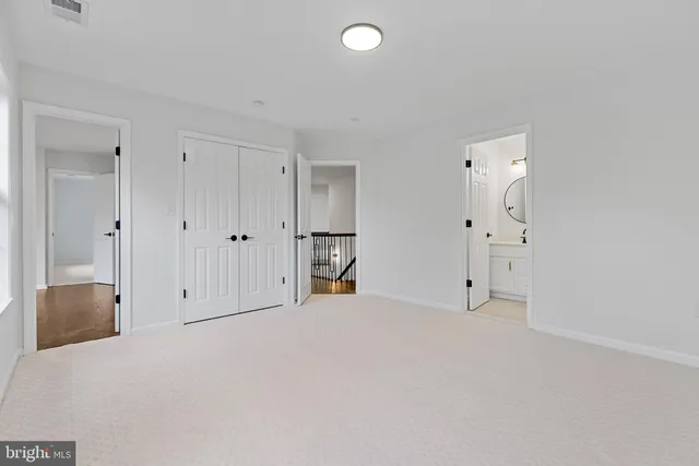 a work room with furniture and a window
