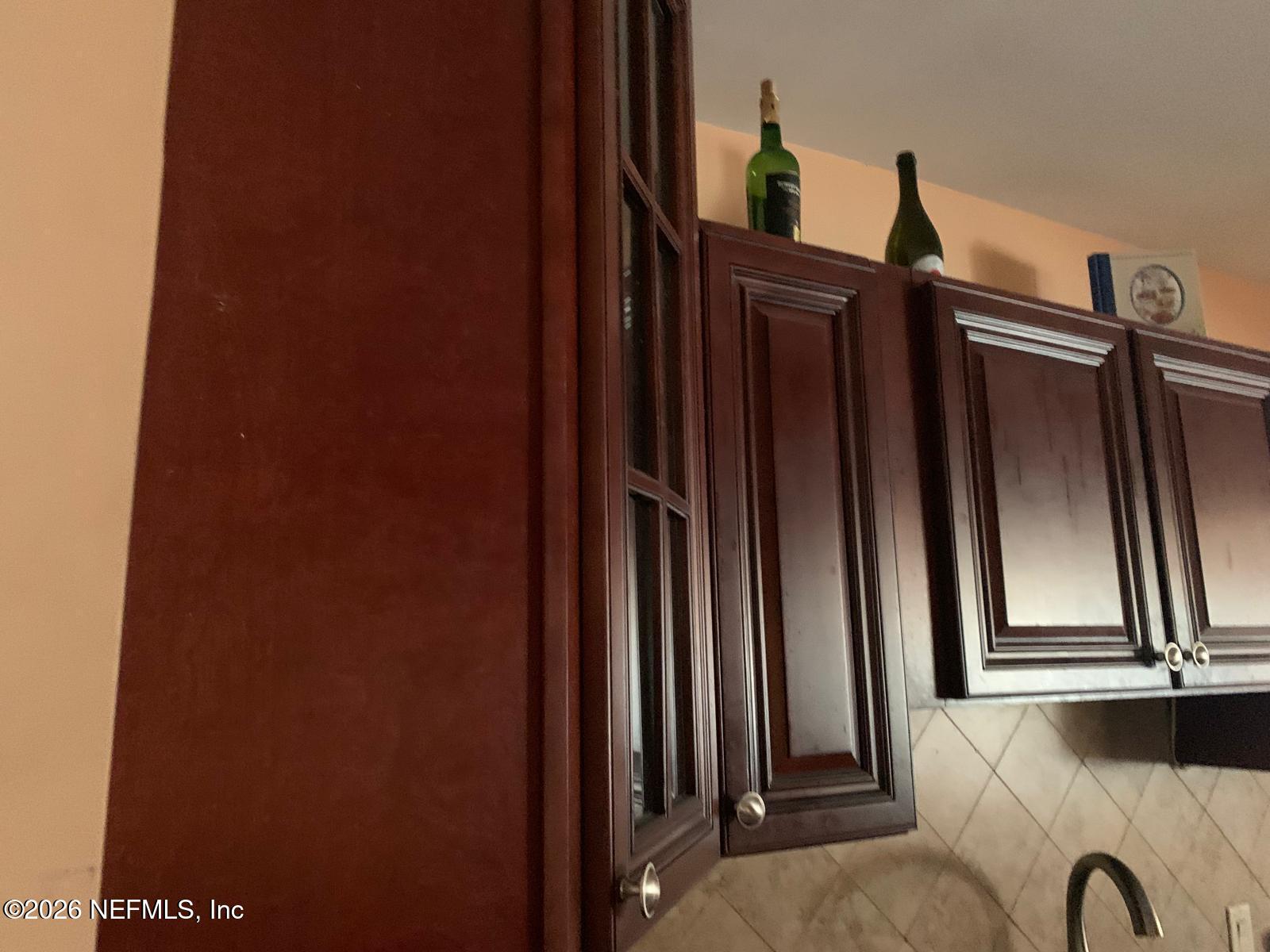 1645 Forest Hills Road Jacksonville, FL 32208 - Photo 13 of 15 wooden floor with a window