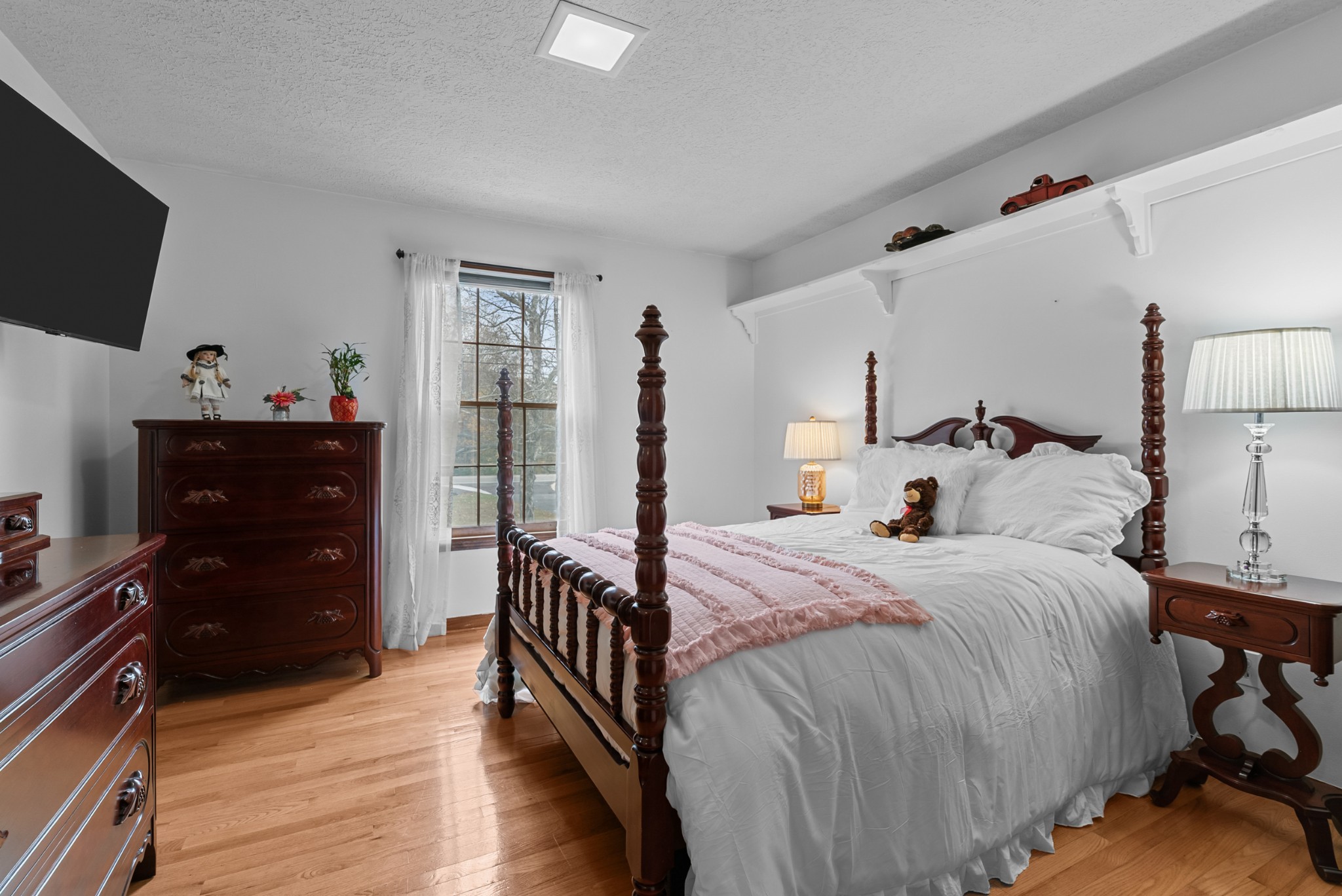 6980 Bethel Road Greenbrier, TN 37073 - Photo 21 of 51 a bed room with a bed and a television