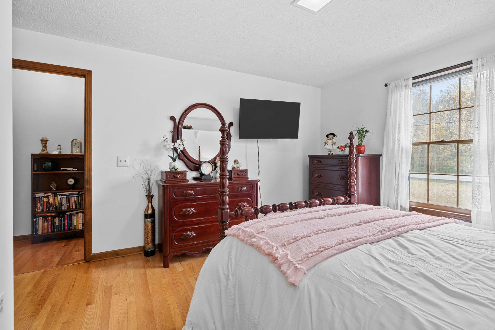 6980 Bethel Road Greenbrier, TN 37073 - Photo 22 of 51 a bedroom with a bed and a dresser