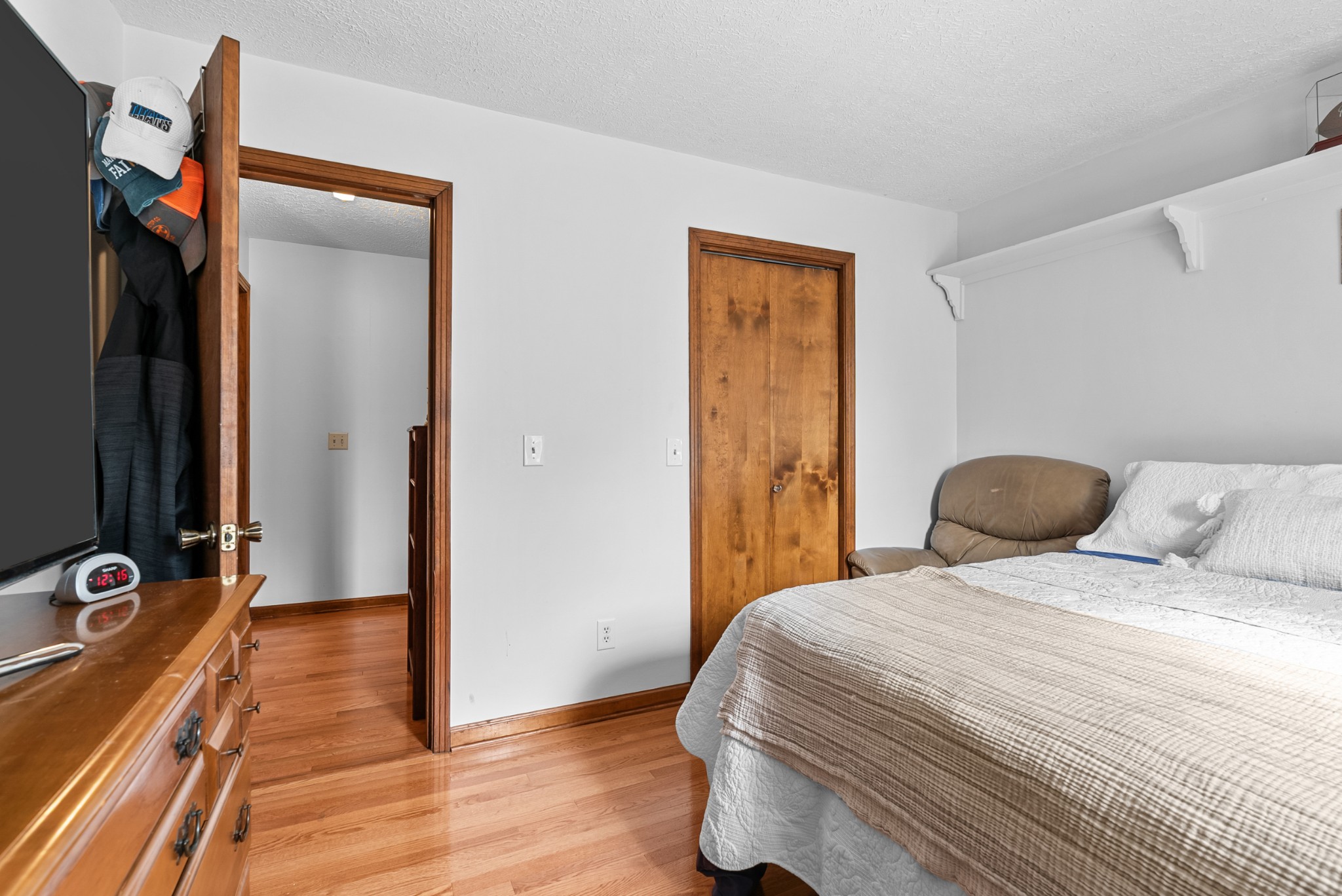6980 Bethel Road Greenbrier, TN 37073 - Photo 33 of 51 a bedroom with a bed and a large mirror on the dresser