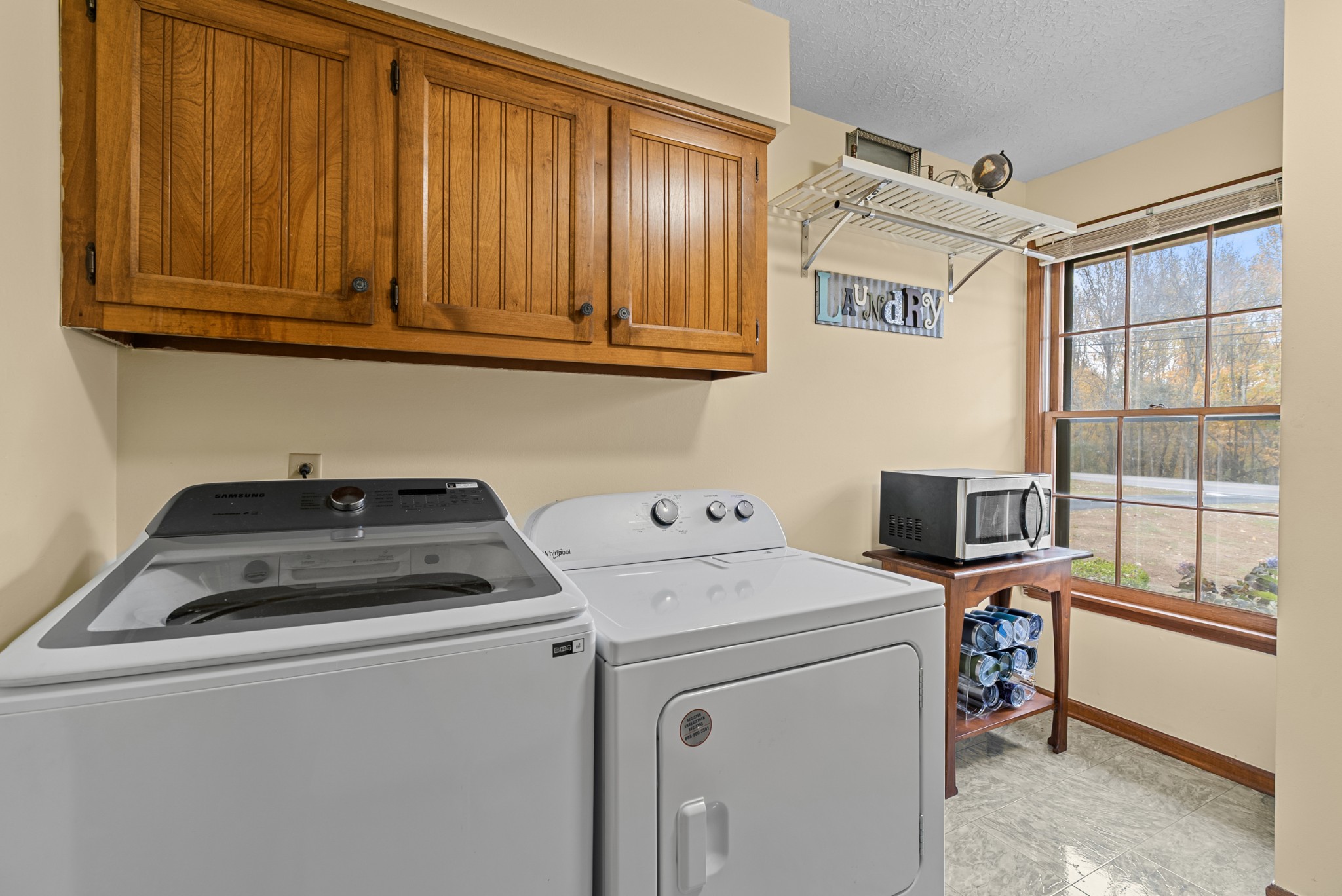 6980 Bethel Road Greenbrier, TN 37073 - Photo 35 of 51 a utility room with dryer and washer