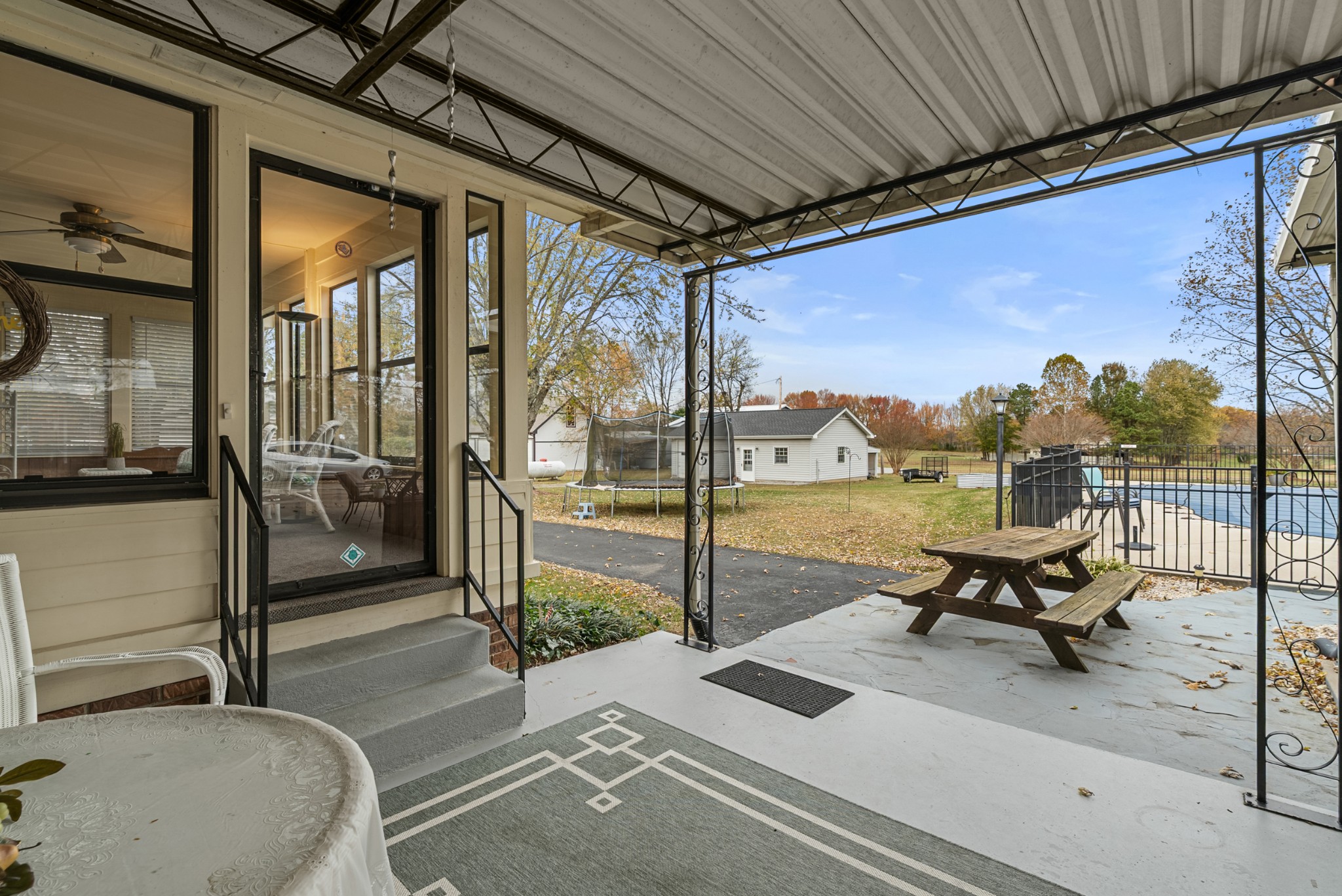 6980 Bethel Road Greenbrier, TN 37073 - Photo 41 of 51 a view of a porch with furniture and a yard