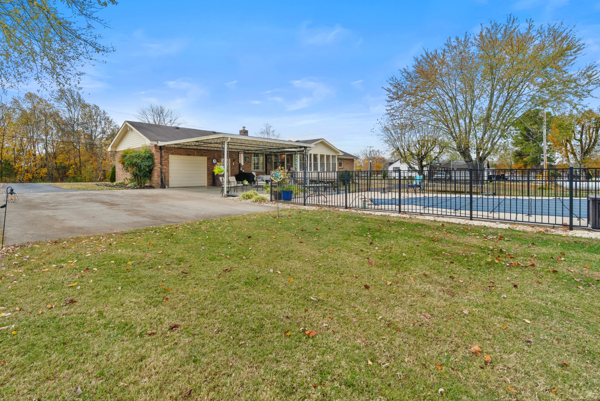 6980 Bethel Road Greenbrier, TN 37073 - Photo 48 of 51 a view of a house with a big yard and large trees