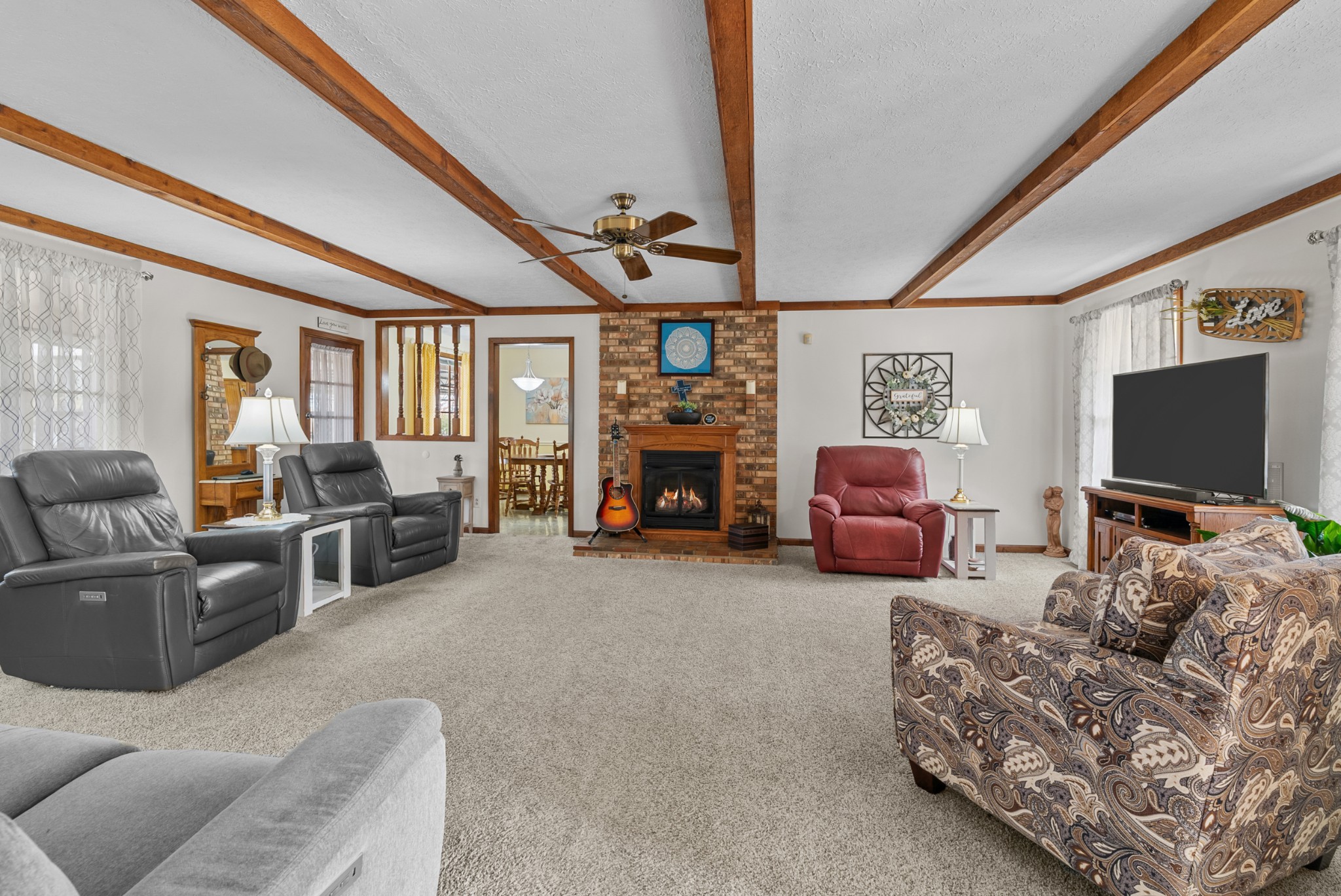 6980 Bethel Road Greenbrier, TN 37073 - Photo 8 of 51 a living room with furniture and a flat screen tv