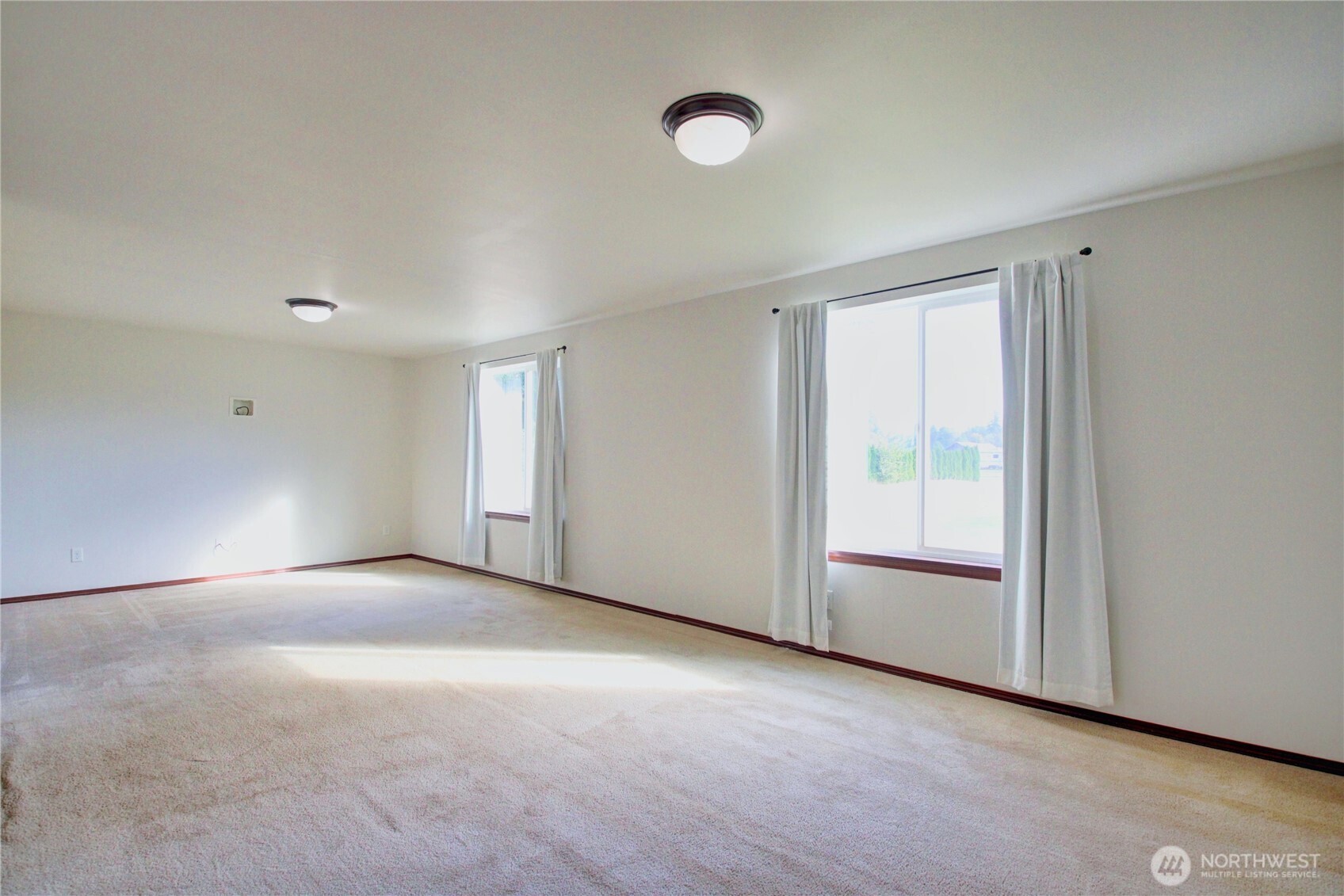 8336 Pinelli Road Sedro-Woolley, WA 98284 - Photo 11 of 15 a view of an empty room with a window