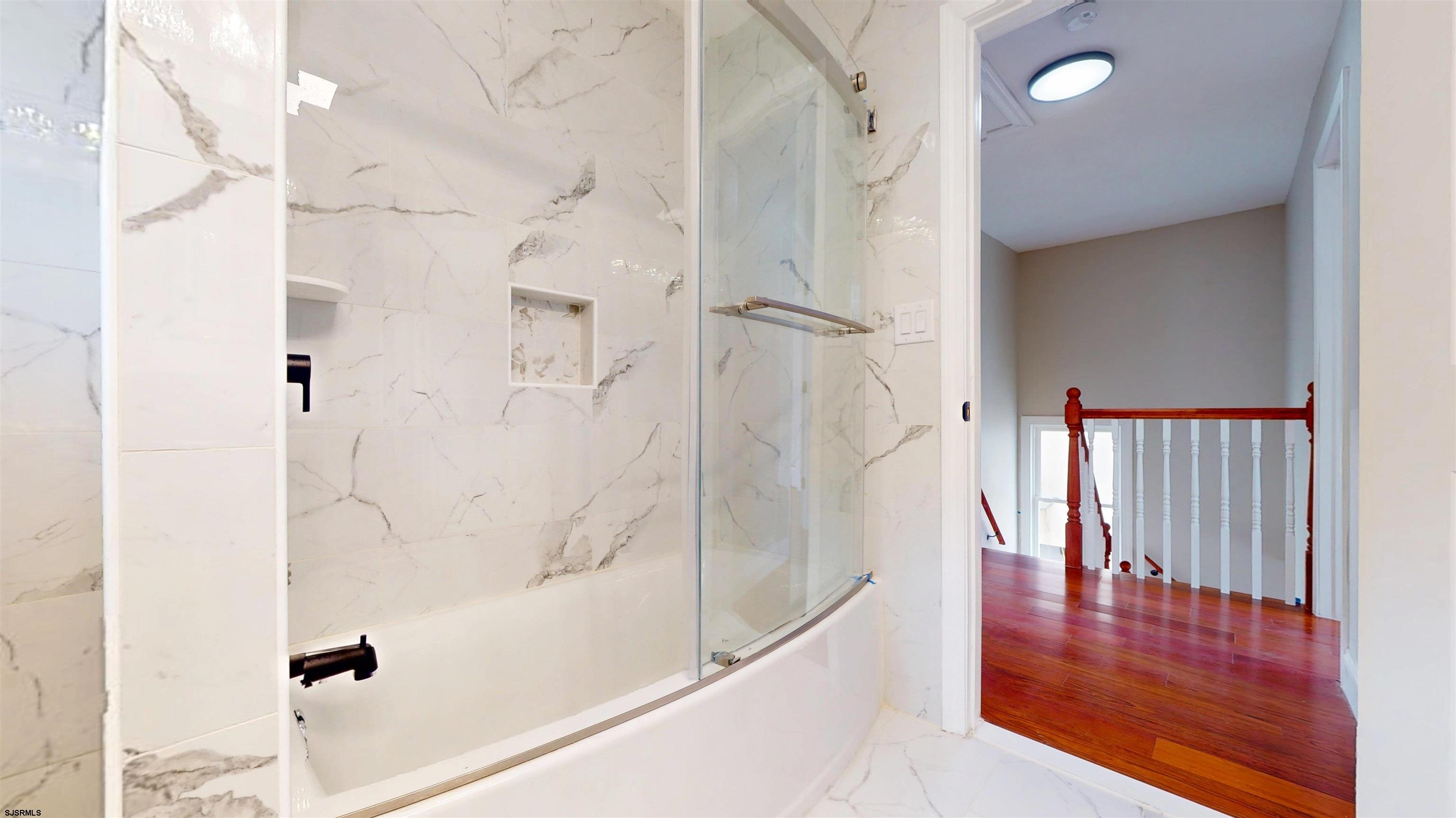 108 East 17th Avenue North Wildwood, NJ 08260 - Photo 39 of 51 a bathroom with a bathtub and shower