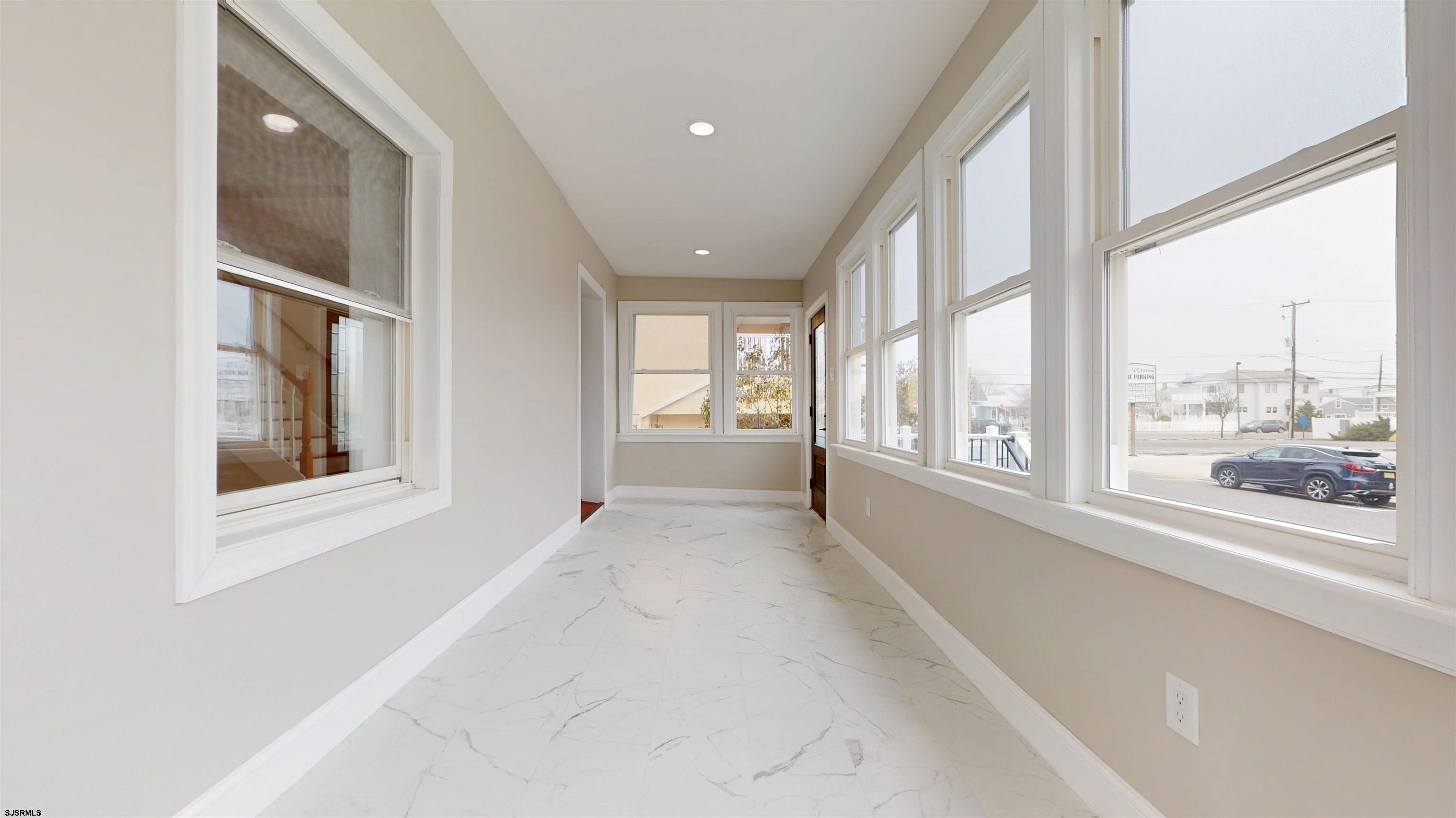 108 East 17th Avenue North Wildwood, NJ 08260 - Photo 10 of 51 a view of an entryway with wooden floor and windows
