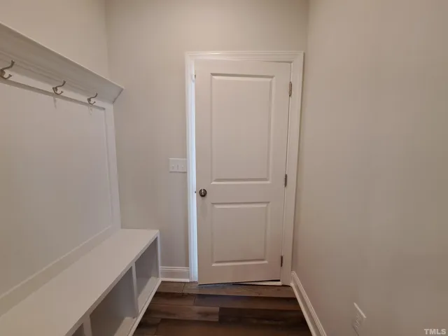 a view of small space with racks on the wall