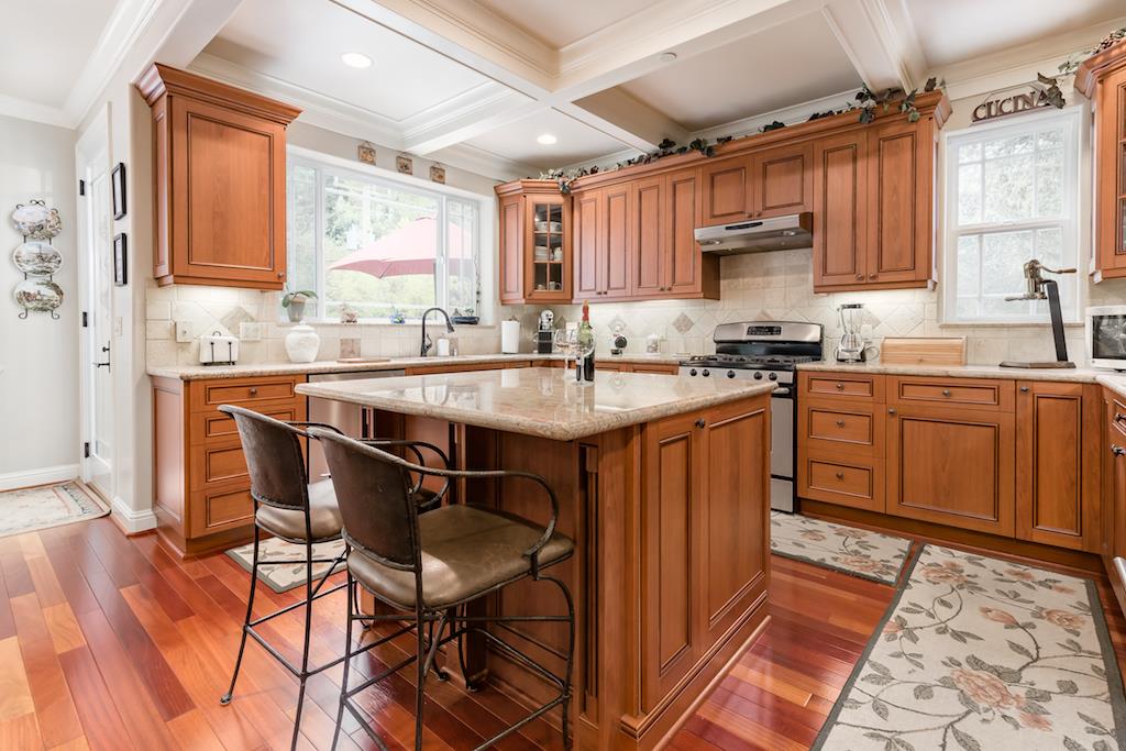 105 E Road Boulder Creek, CA 95006 - Photo 11 of 50 a kitchen with a sink stove and cabinets