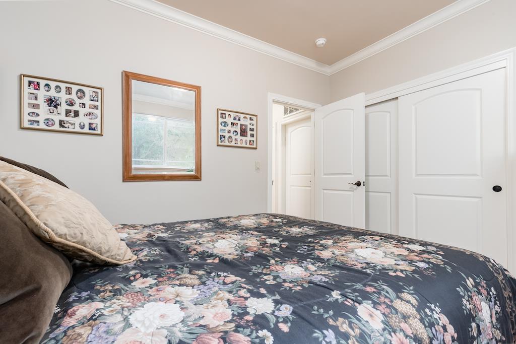 105 E Road Boulder Creek, CA 95006 - Photo 24 of 50 a bedroom with a bed and a window