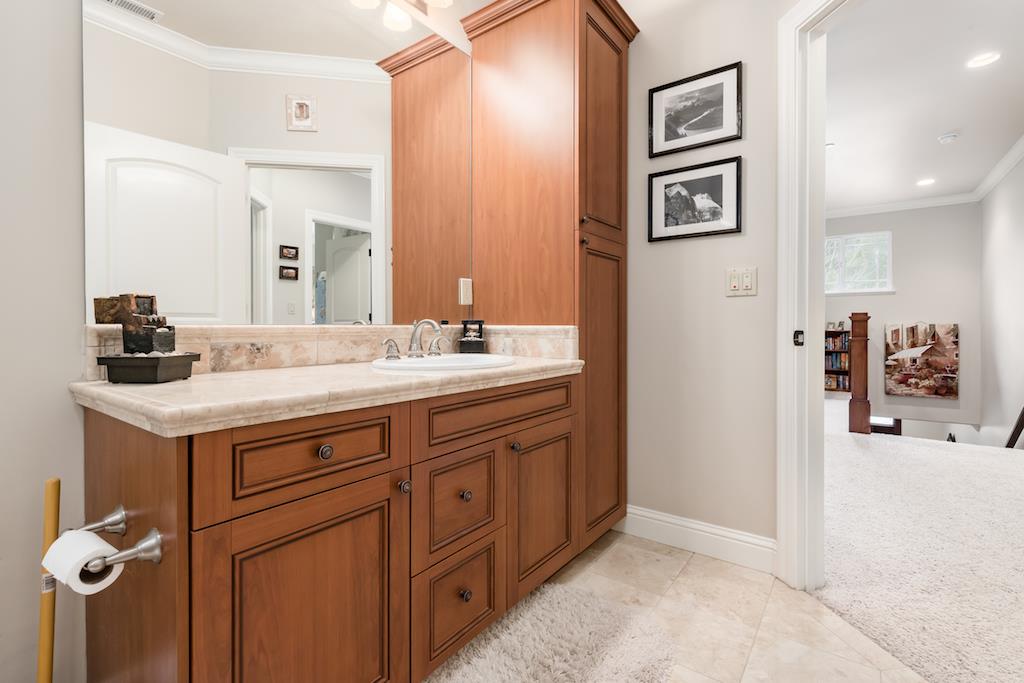 105 E Road Boulder Creek, CA 95006 - Photo 29 of 50 a bathroom with a sink a mirror and a shower