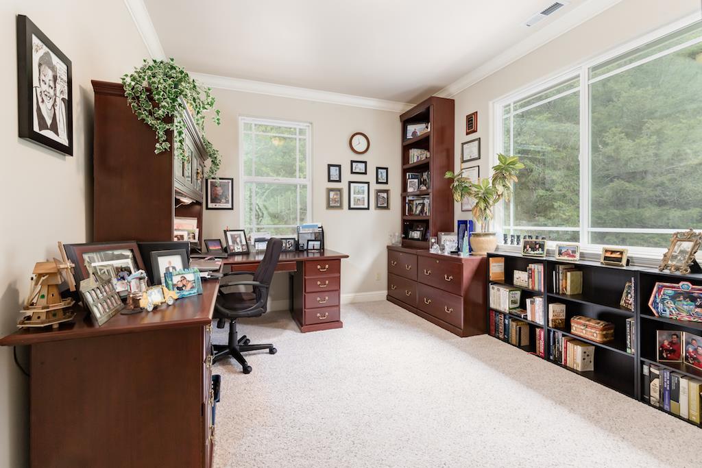 105 E Road Boulder Creek, CA 95006 - Photo 31 of 50 a room with furniture cabinets and a window