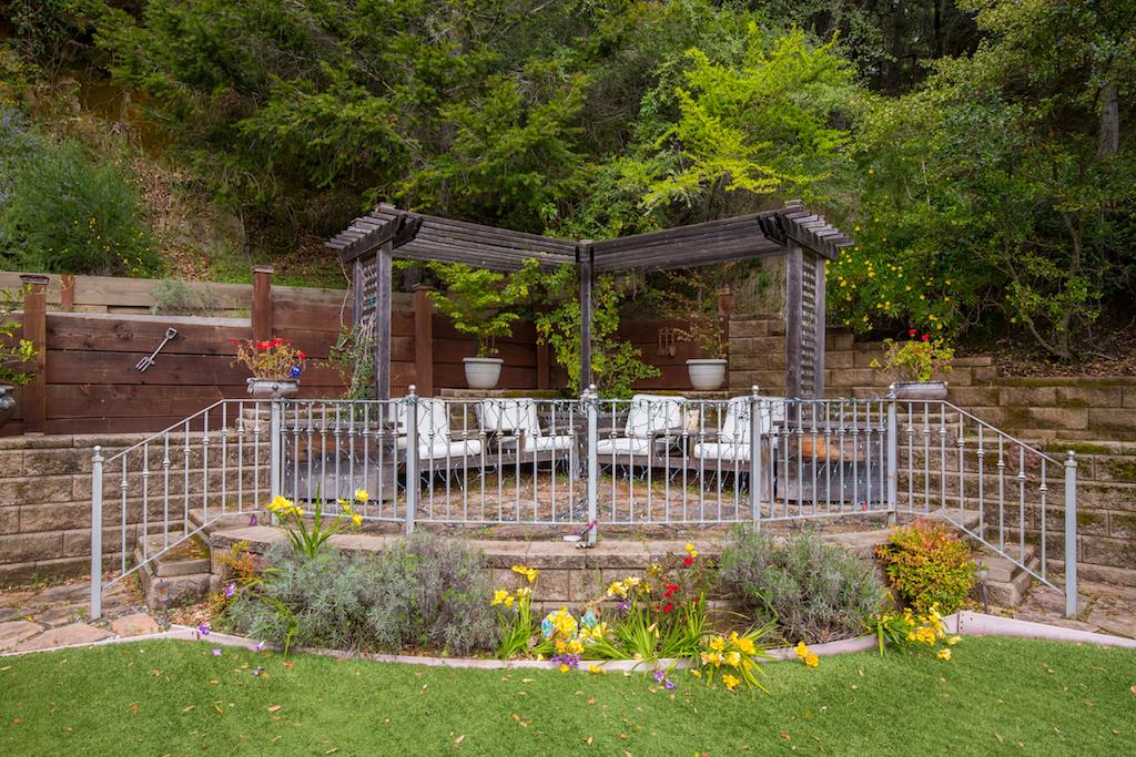 105 E Road Boulder Creek, CA 95006 - Photo 36 of 50 a view of a chair and table in backyard
