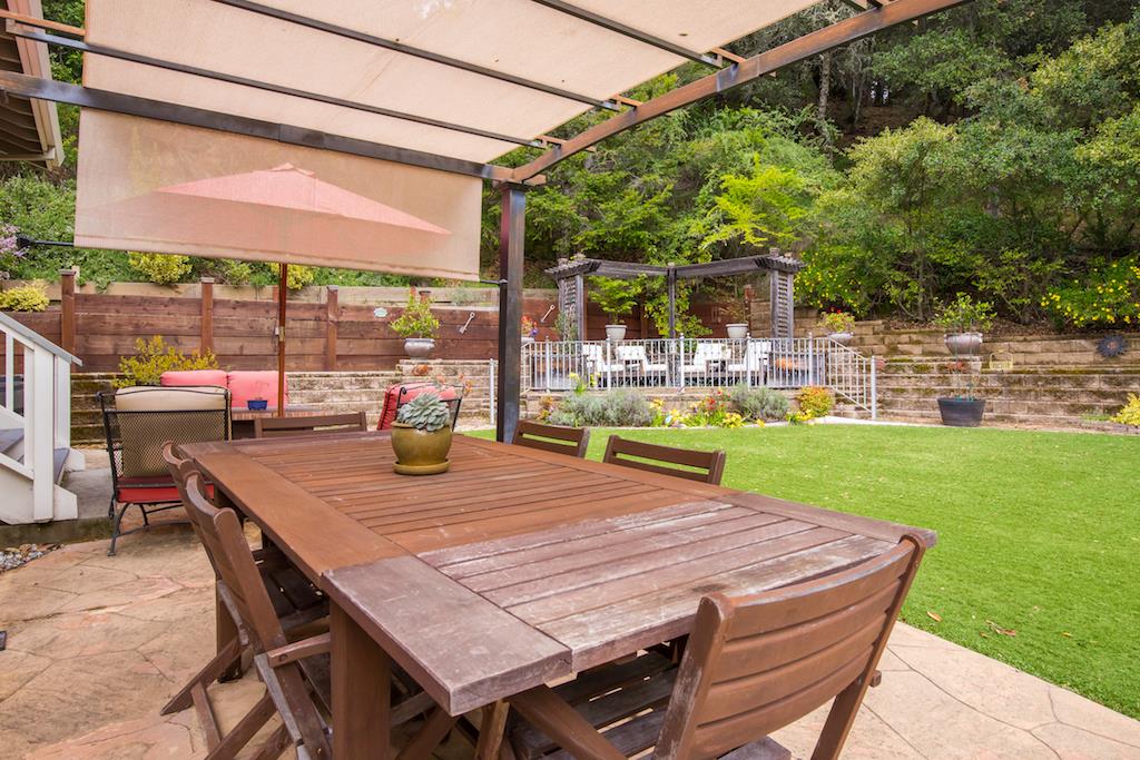 105 E Road Boulder Creek, CA 95006 - Photo 39 of 50 a view of an outside dining space with furniture