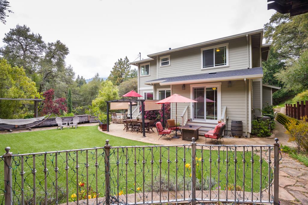 105 E Road Boulder Creek, CA 95006 - Photo 43 of 50 a view of a house with backyard and sitting area
