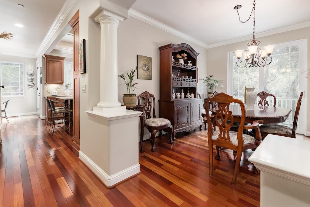 105 E Road Boulder Creek, CA 95006 - Photo 7 of 50 a view of a dining room with furniture wooden floor and a chandelier