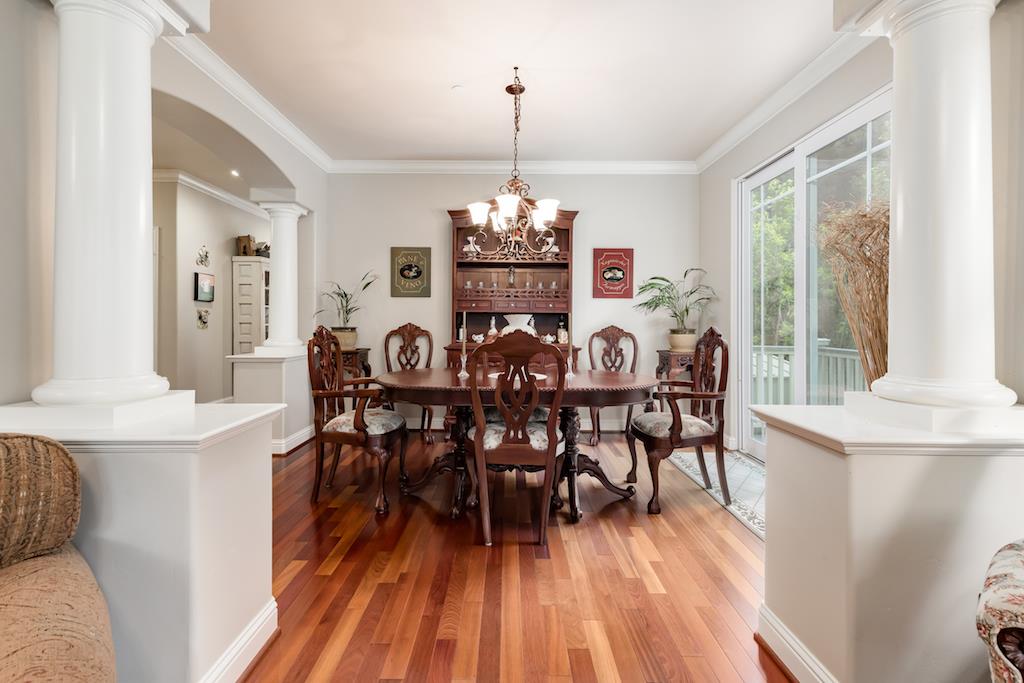 105 E Road Boulder Creek, CA 95006 - Photo 8 of 50 a view of a dining room with furniture window and wooden floor