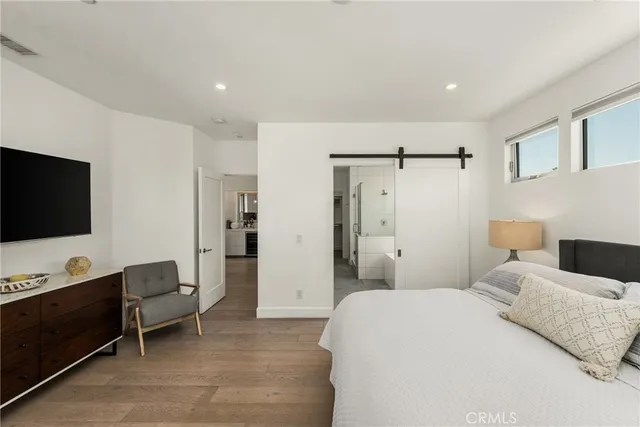 a bathroom with a shower and a sink