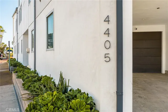 an aerial view of a city with lots of residential buildings