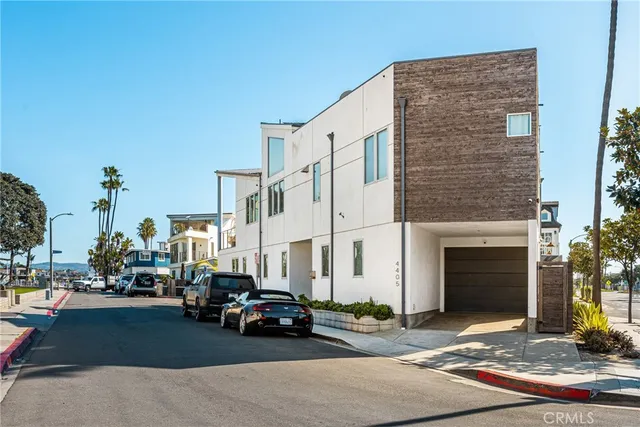 an aerial view of a city with ocean view