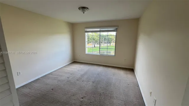 an empty room with a window