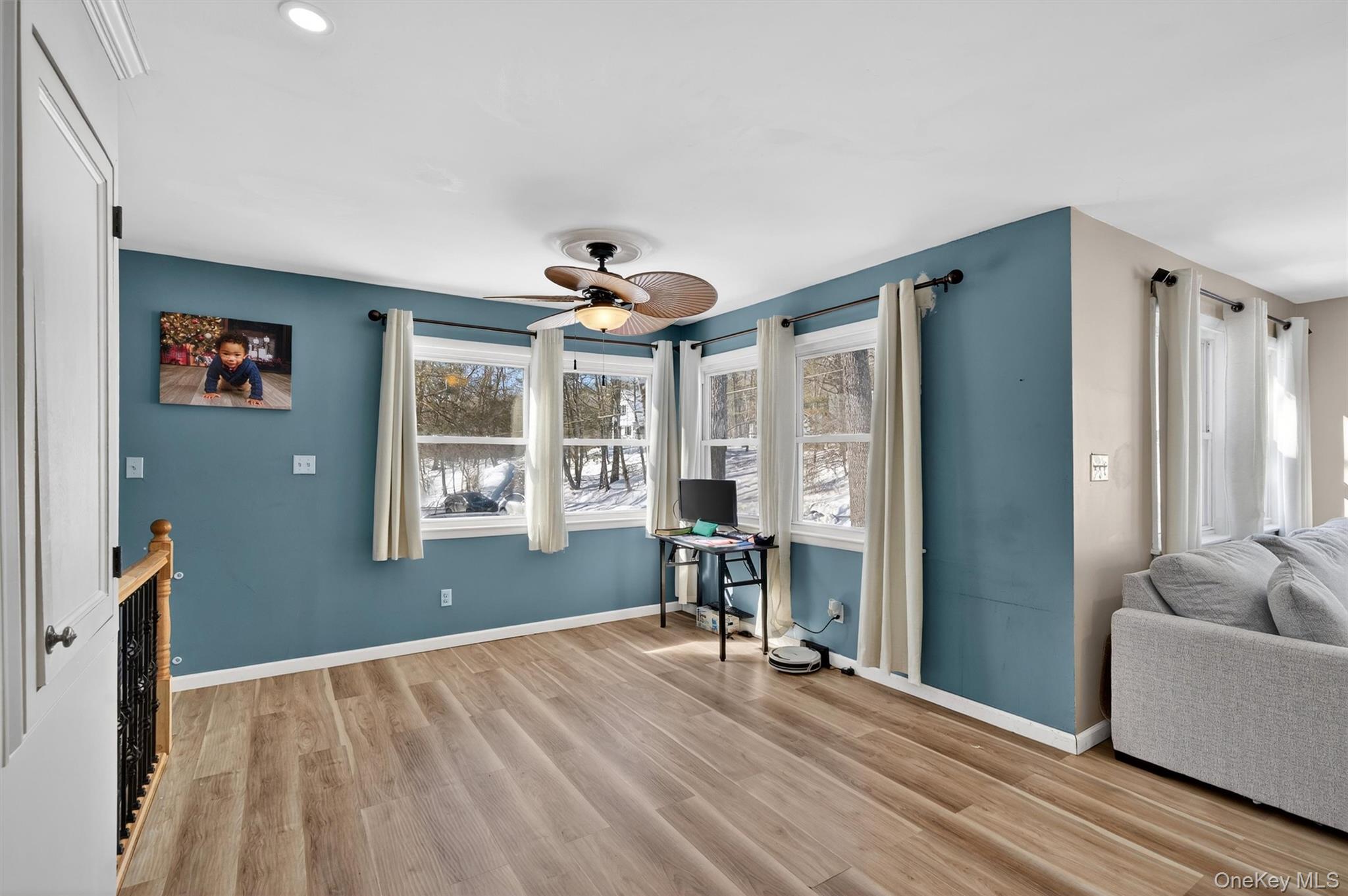 51 East Green Road Rock Tavern, NY 12575 - Photo 15 of 43 a view of livingroom with hardwood floor and a ceiling fan