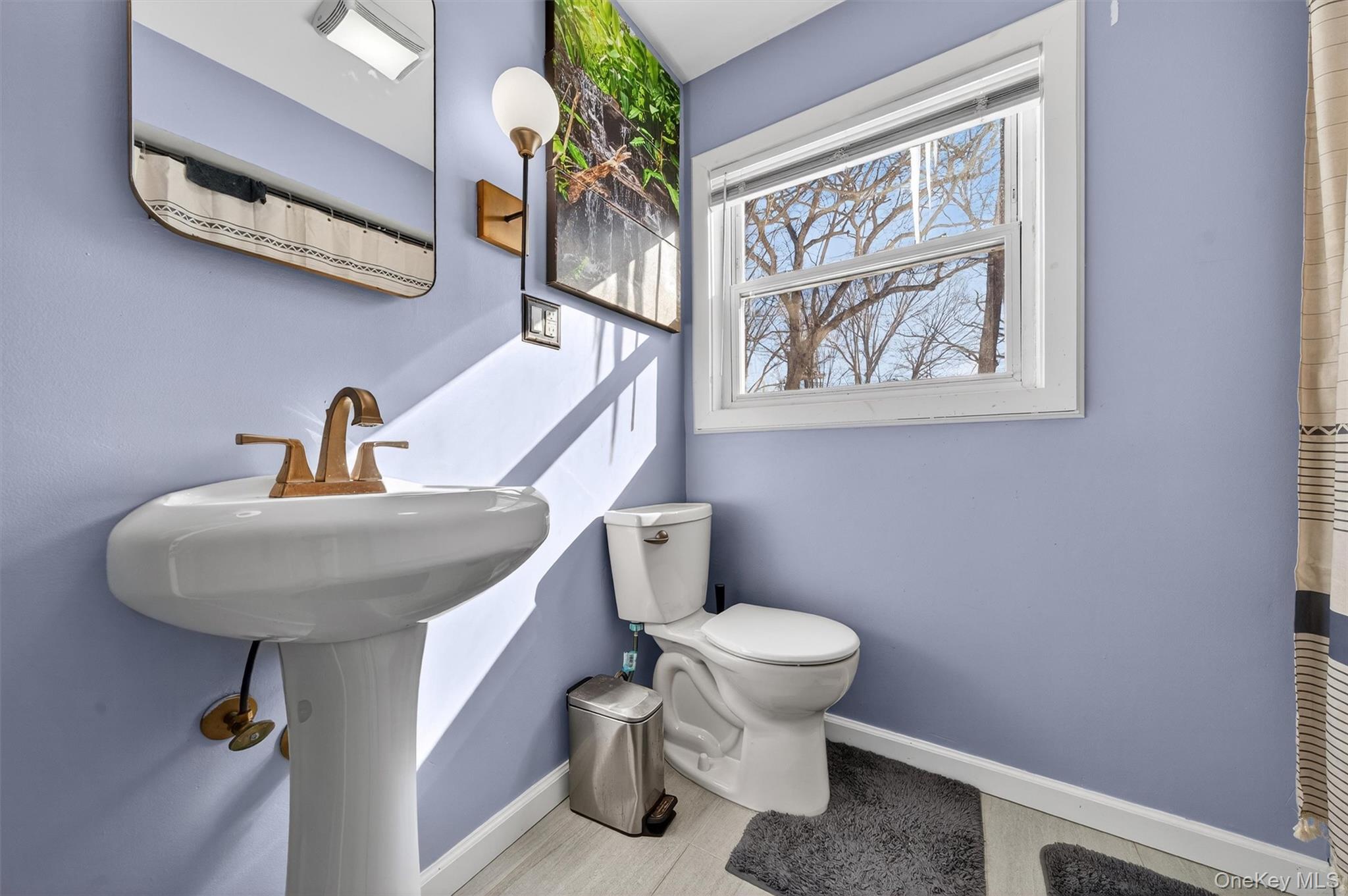 51 East Green Road Rock Tavern, NY 12575 - Photo 24 of 43 a bathroom with a toilet sink and mirror