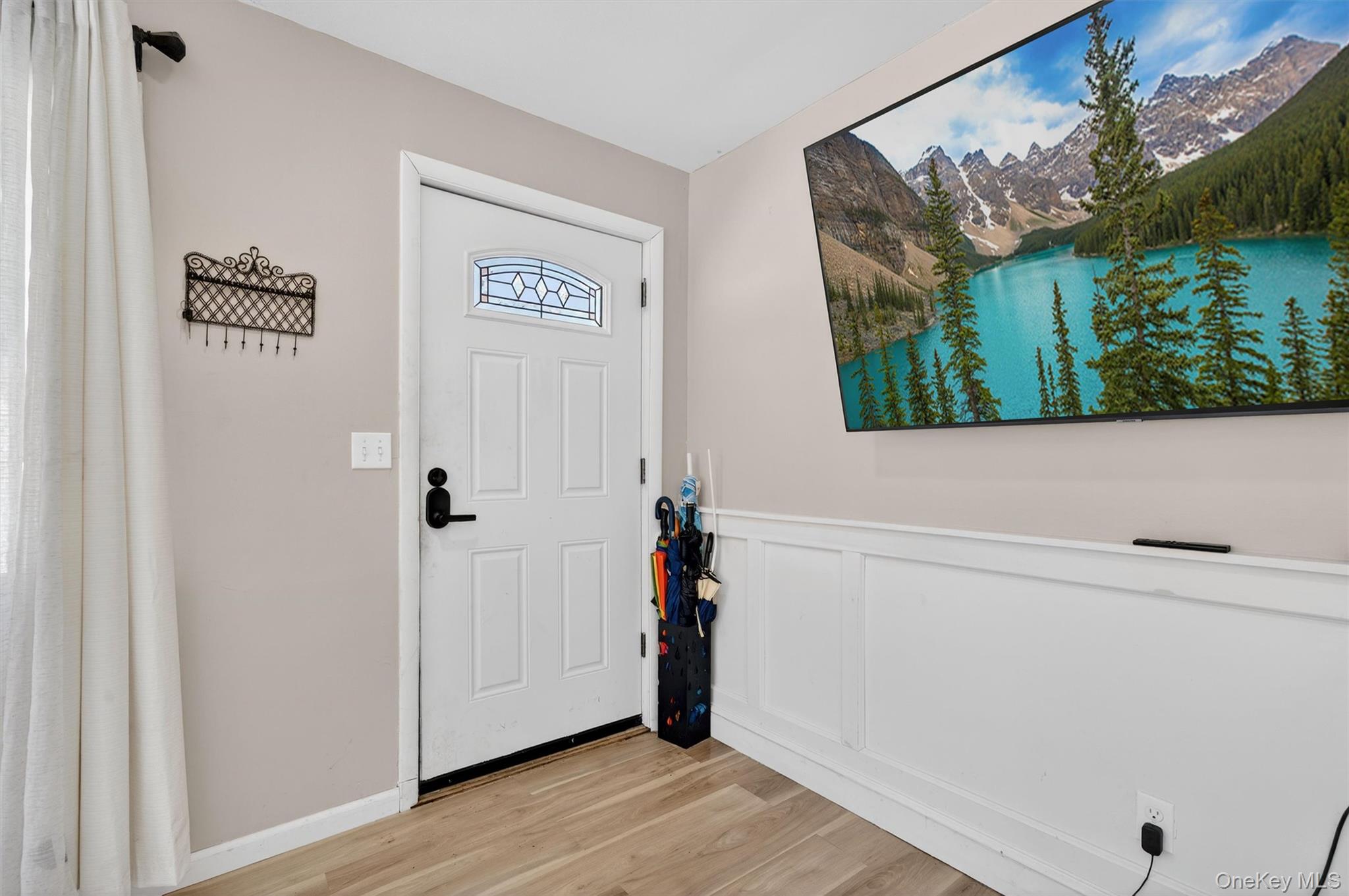 51 East Green Road Rock Tavern, NY 12575 - Photo 7 of 43 a view of front door with wooden floor
