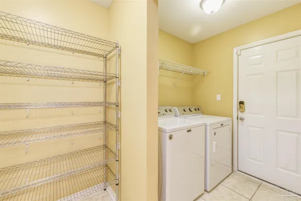 a bathroom with a sink a mirror and a shower