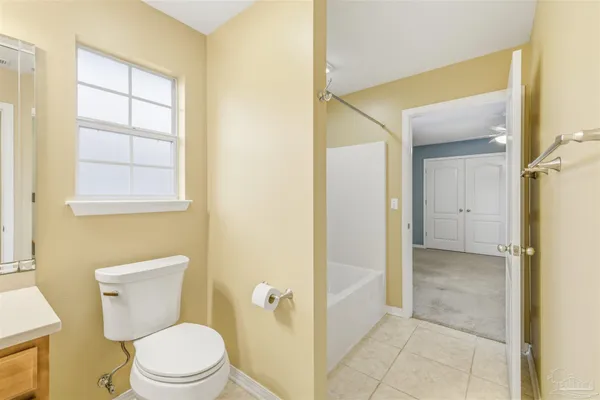 a bathroom with a toilet