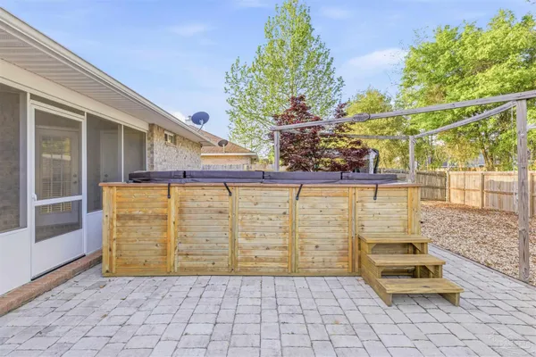 a view of a terrace with wooden fence