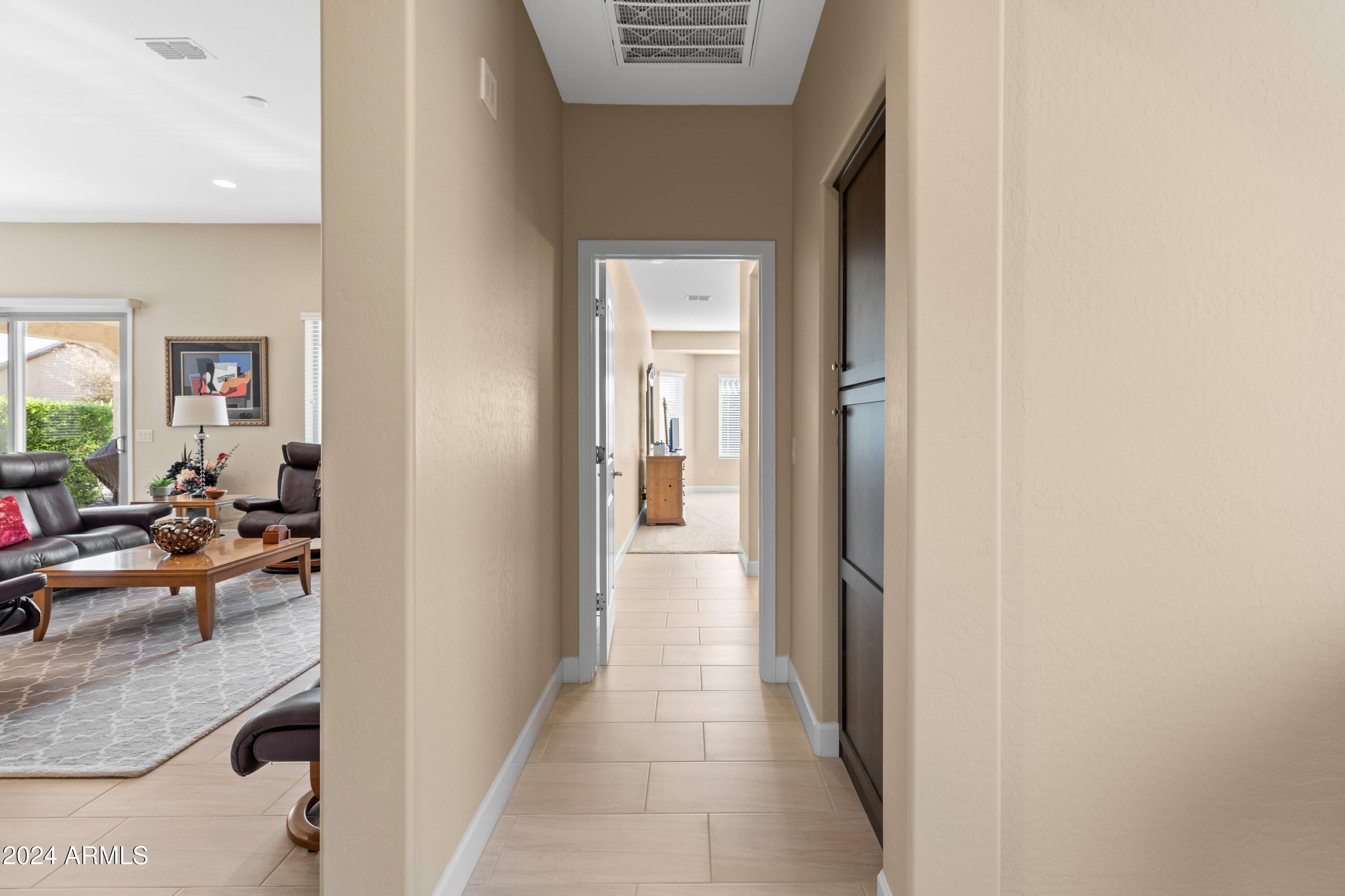 16807 West Berkeley Road Goodyear, AZ 85395 - Photo 13 of 48 16807 W Berkeley Rd Mstr hallway