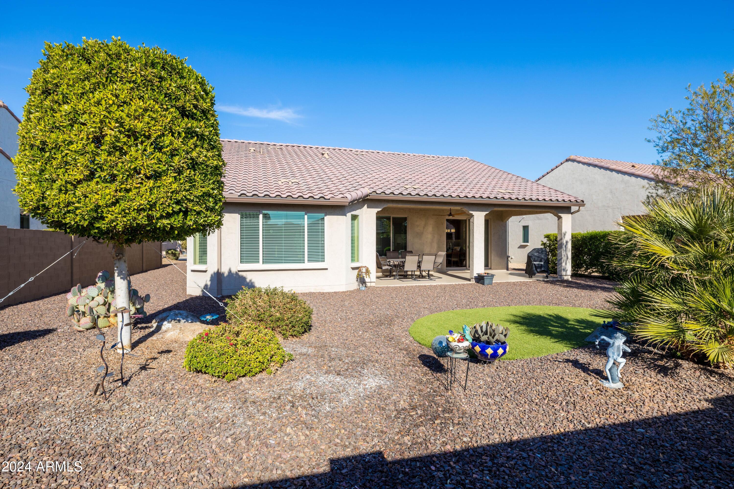 16807 West Berkeley Road Goodyear, AZ 85395 - Photo 26 of 48 16807 W Berkeley Rd backyard from fence