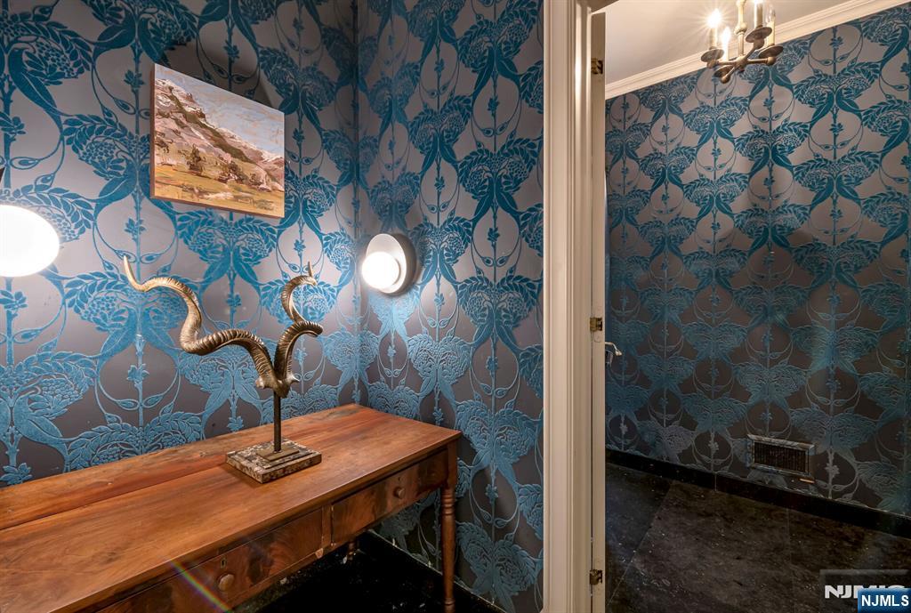 681 Closter Dock Road Closter, NJ 07624 - Photo 14 of 40 a view of a dining room with a sink and a mirror