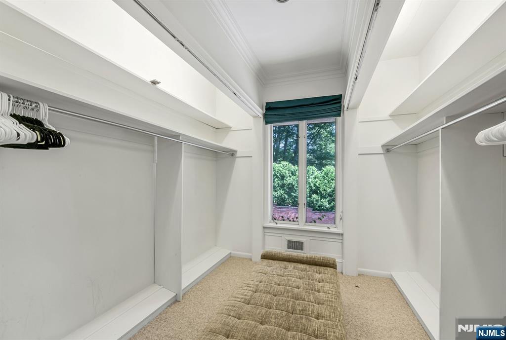 681 Closter Dock Road Closter, NJ 07624 - Photo 18 of 40 a view of an entryway with wooden floor and a sink