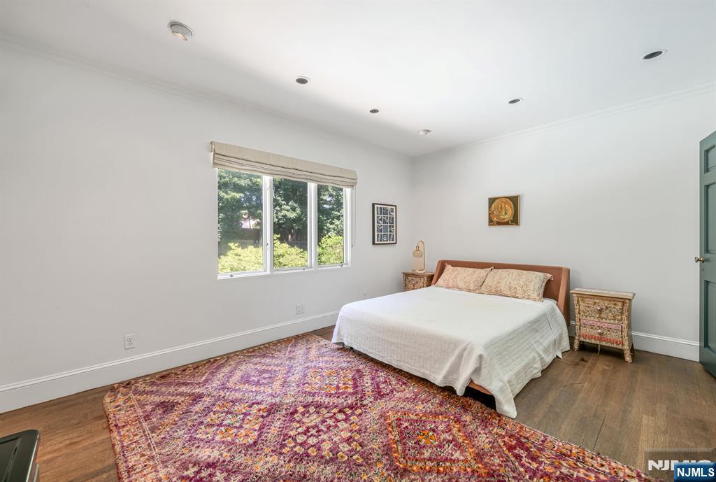 681 Closter Dock Road Closter, NJ 07624 - Photo 23 of 40 a bedroom with a bed and a window