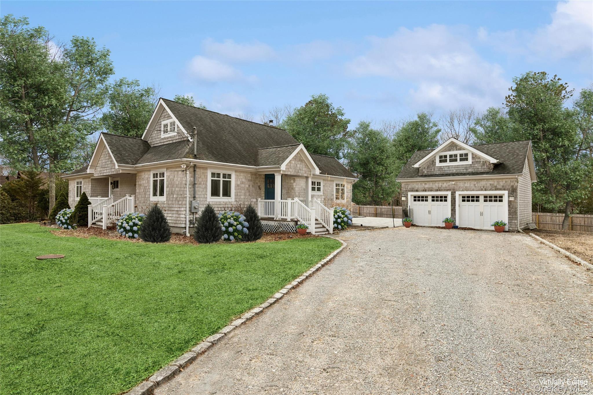 front view of a house with a garden
