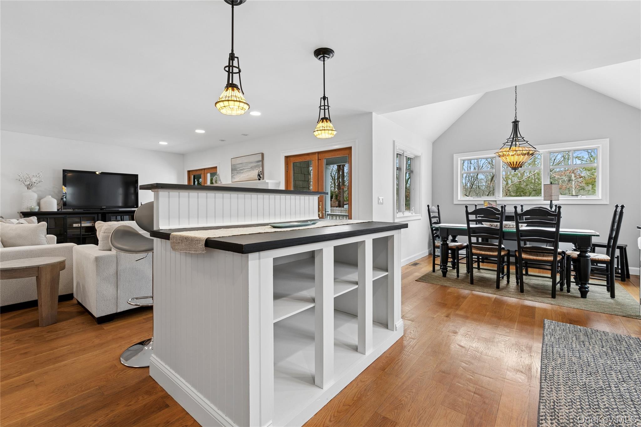 10 Foxboro Road East Quogue, NY 11946 - Photo 12 of 31 a view of kitchen with furniture and wooden floor