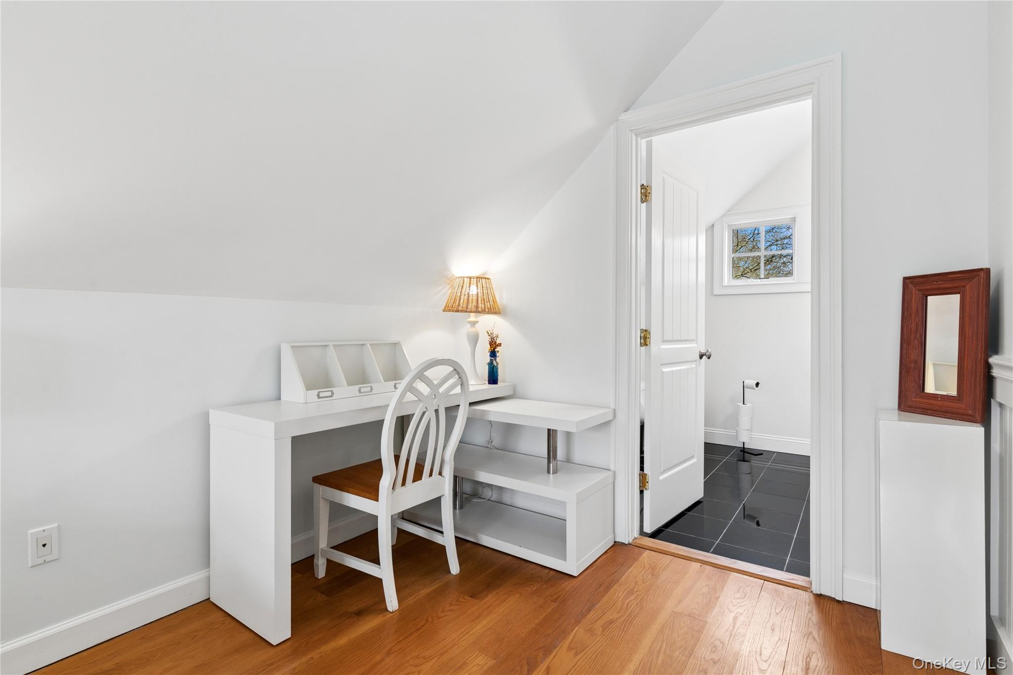 10 Foxboro Road East Quogue, NY 11946 - Photo 30 of 31 a view of a workspace with wooden floor