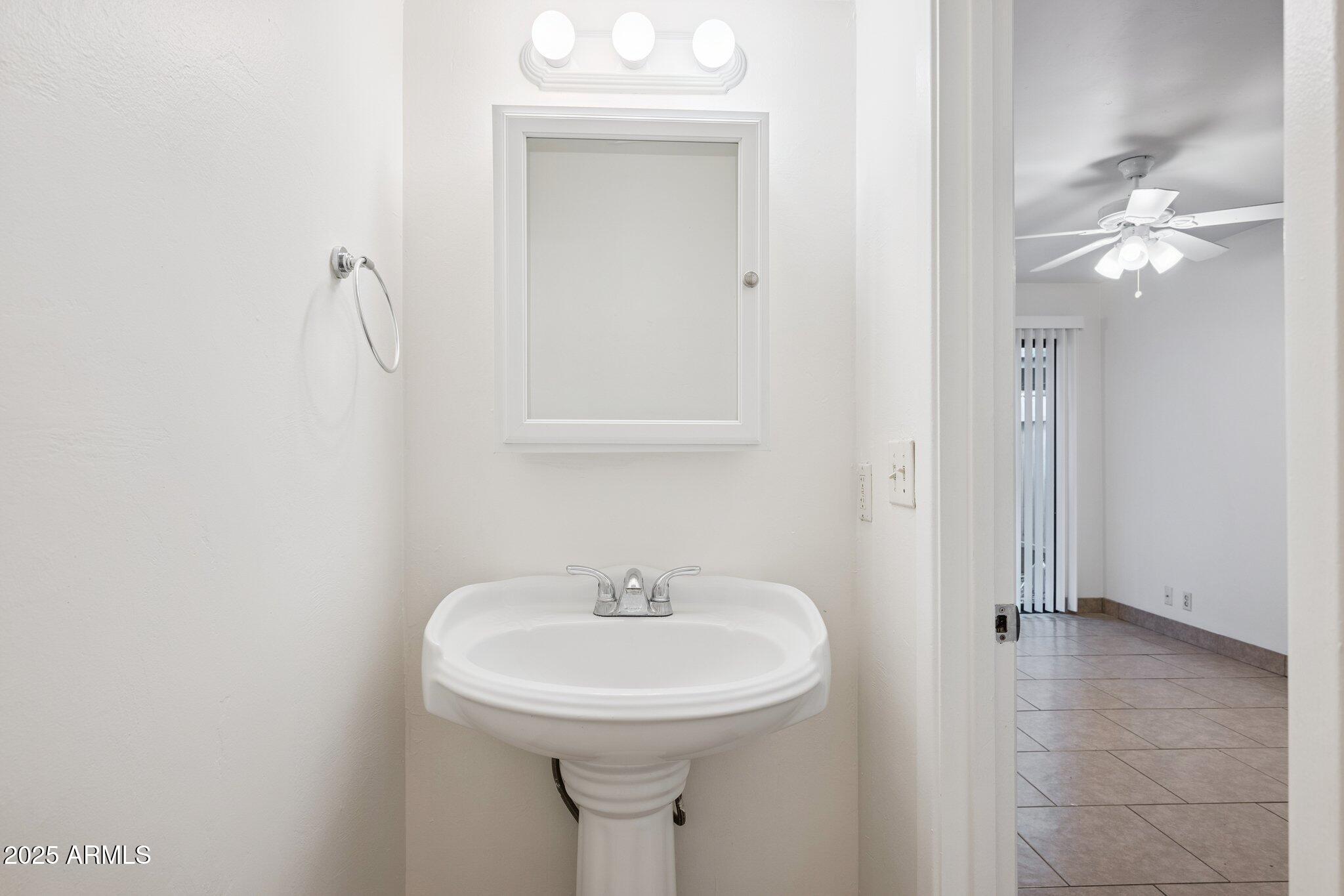 286 West Palomino Drive, Unit 79 Chandler, AZ 85225 - Photo 13 of 26 Downstairs Half Bath