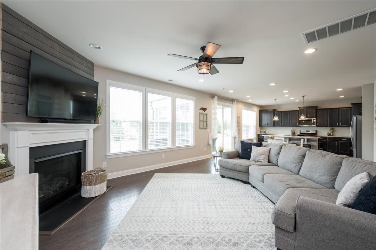 409 Morgan Ridge Road Holly Springs, NC 27540 - Photo 5 of 30 Enjoy a spacious living room that opens to dining area and large, eat-in kitchen Living Room
