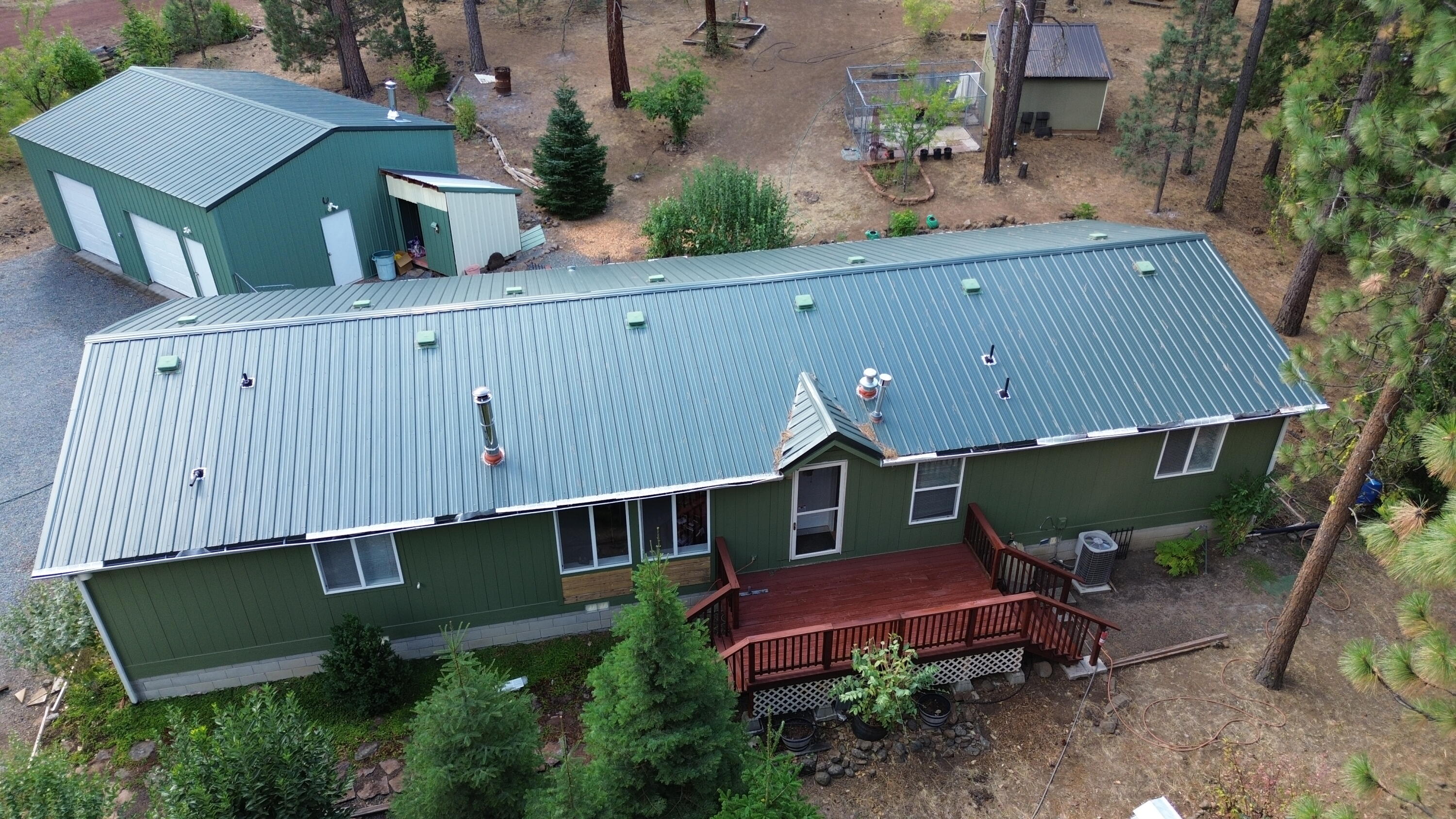 34 Hideaway Lane Adin, CA 96006 - Photo 15 of 26 an aerial view of a house with garden space and street view
