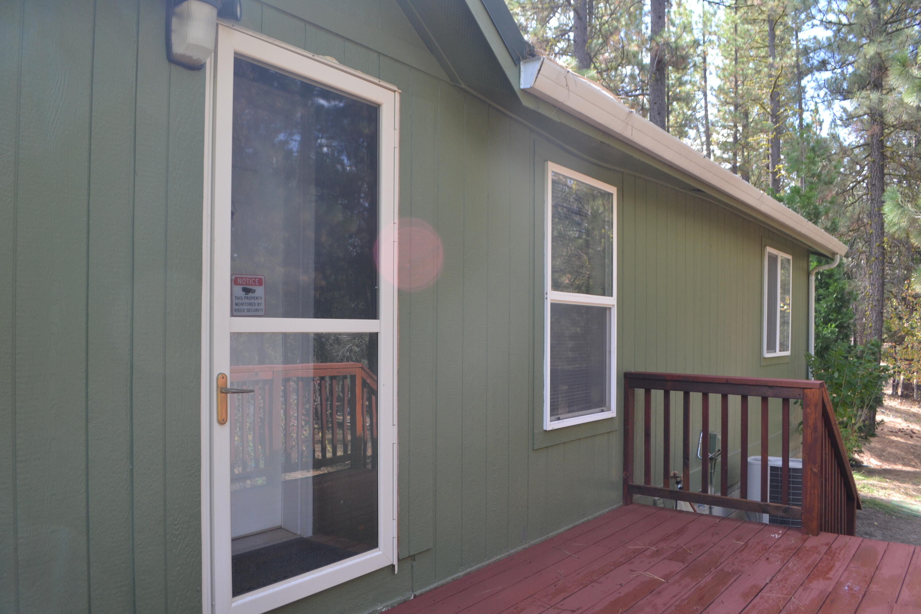 34 Hideaway Lane Adin, CA 96006 - Photo 20 of 26 a view of front door and porch