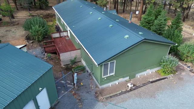 a house with trees in front of it