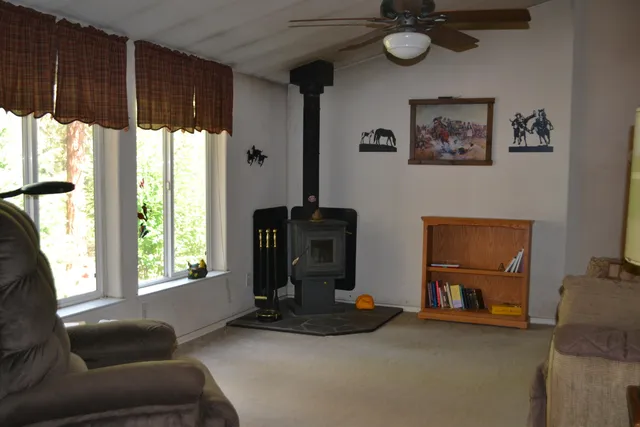 a view of workspace with furniture and window