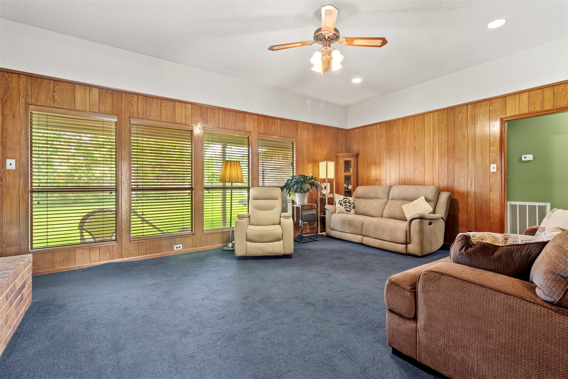 206 Stanford Road Lake Jackson, TX 77566 - Photo 6 of 26 a living room with furniture and a large window
