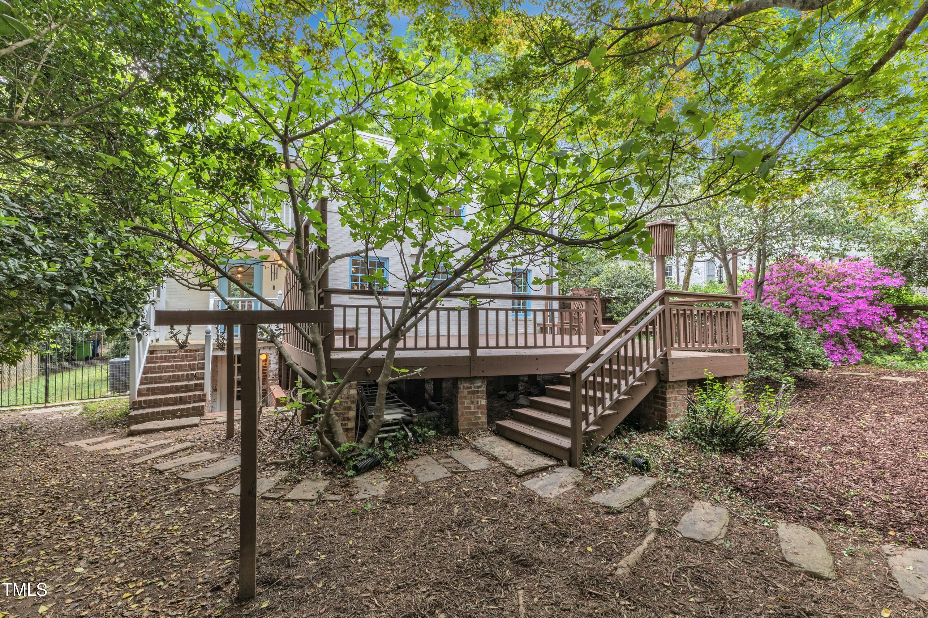 2625 Dover Road Raleigh, NC 27608 - Photo 74 of 90 a front view of a house with a garden