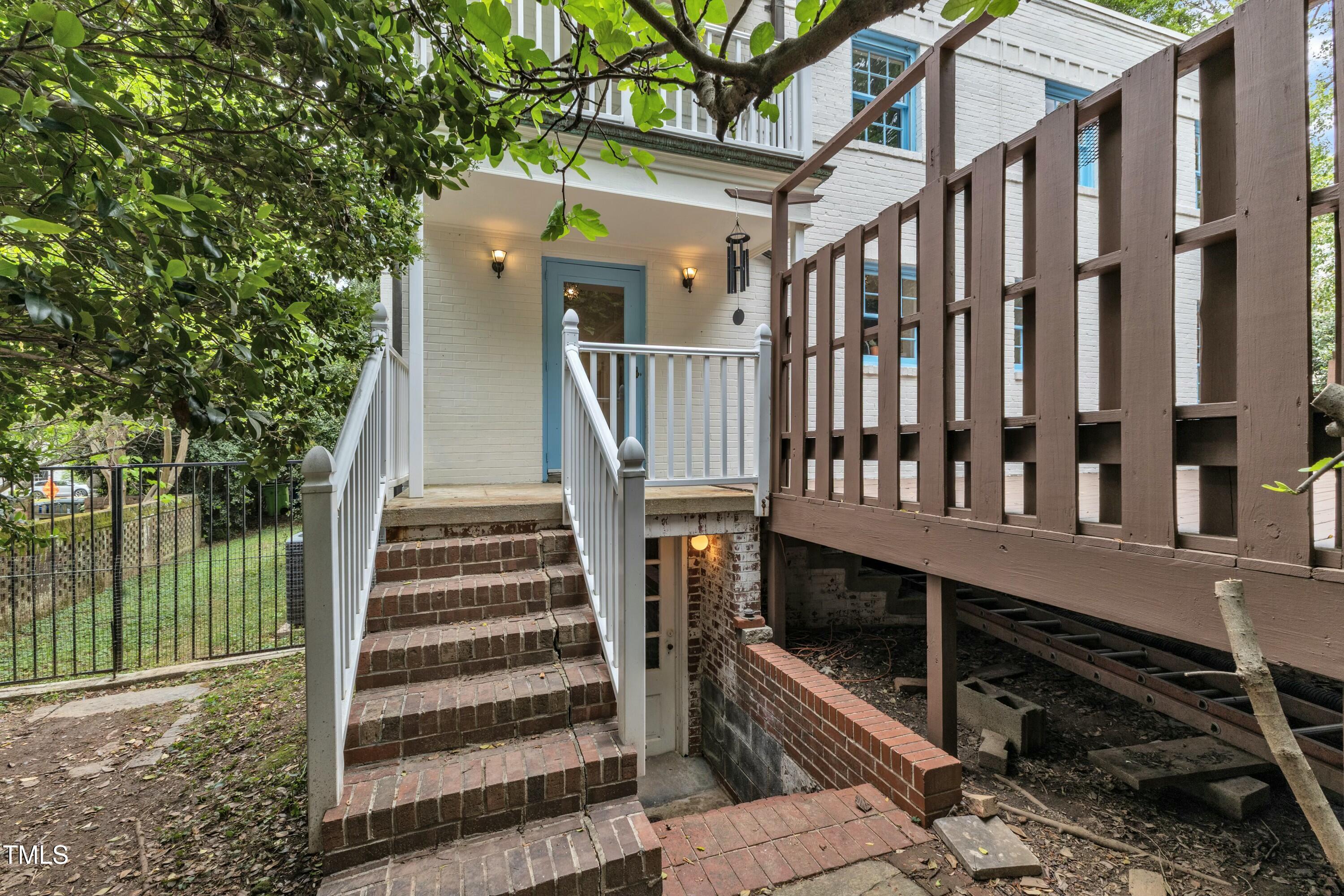 2625 Dover Road Raleigh, NC 27608 - Photo 77 of 90 a view of a house with a deck